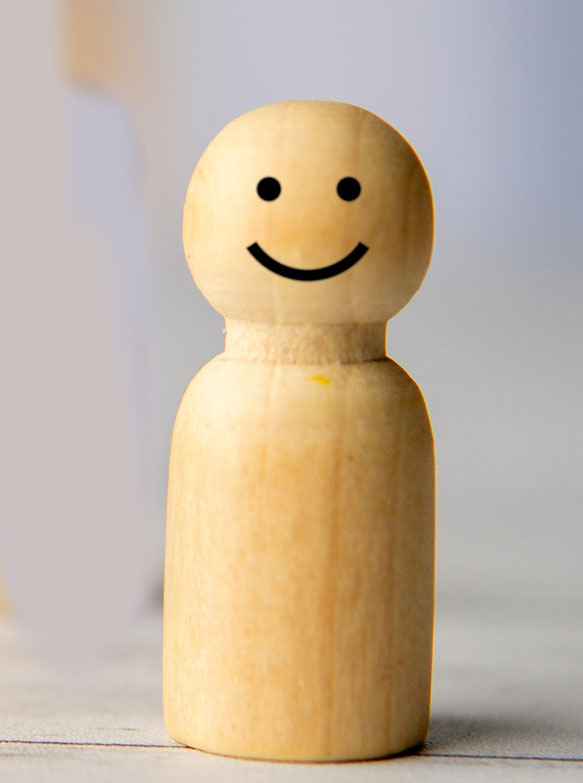 happy-guy-2 Wooden toy with happy face on it.